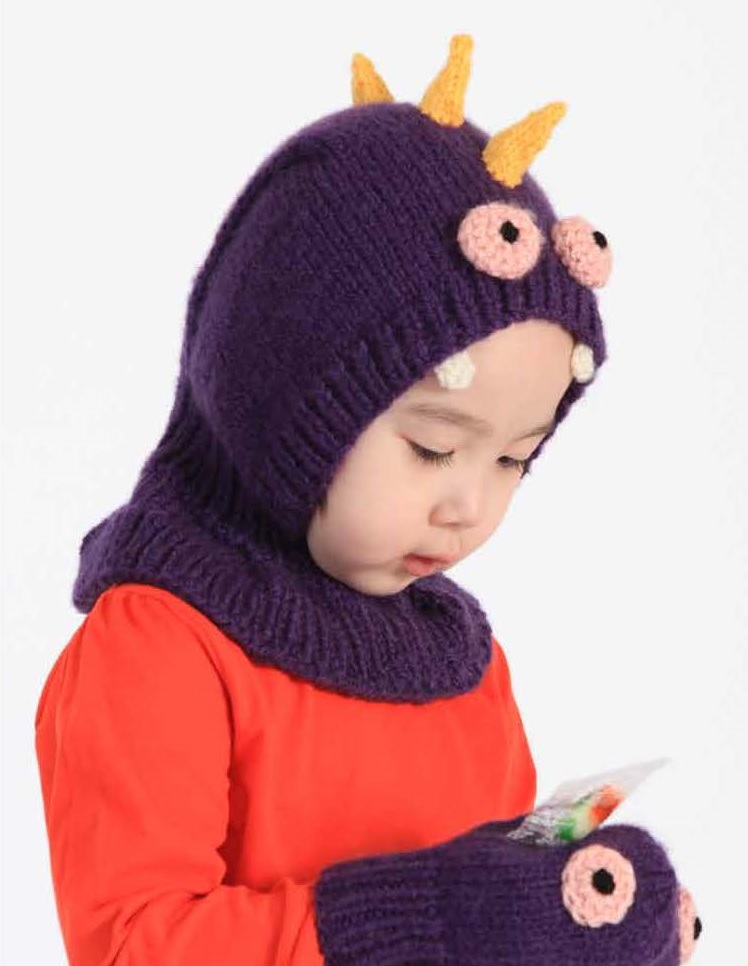 monster knits wearing by a kid